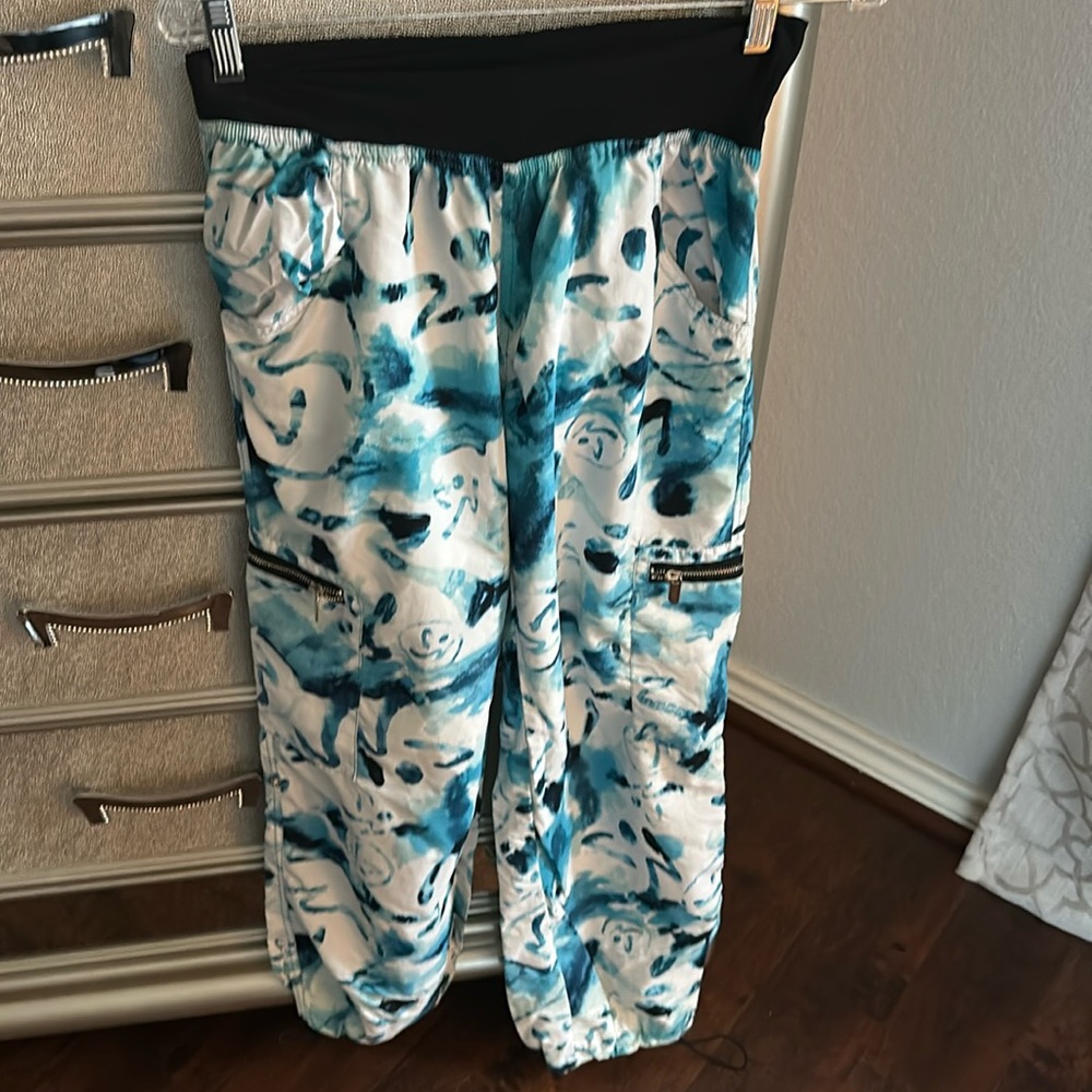 Size medium brand new blue watercolor Zumba pants with pockets